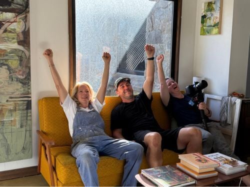 Behind the scenes - Toni and Take Two team members on the couch