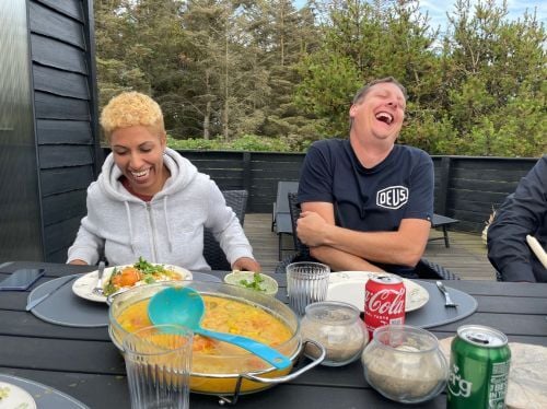 Break from filming for lunch - people sitting at a table with lunch