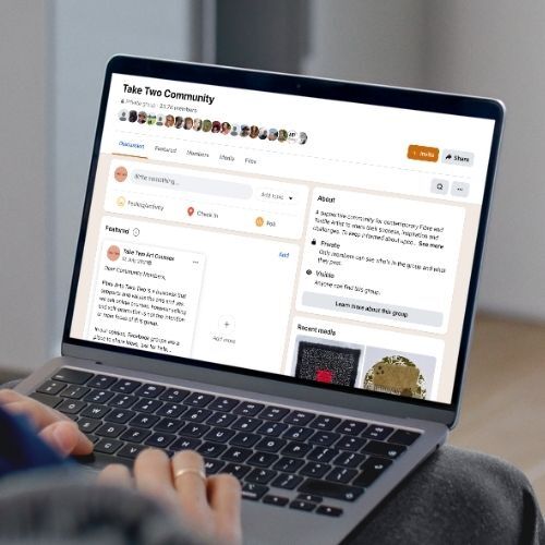 Take Two online community displayed on a laptop screen