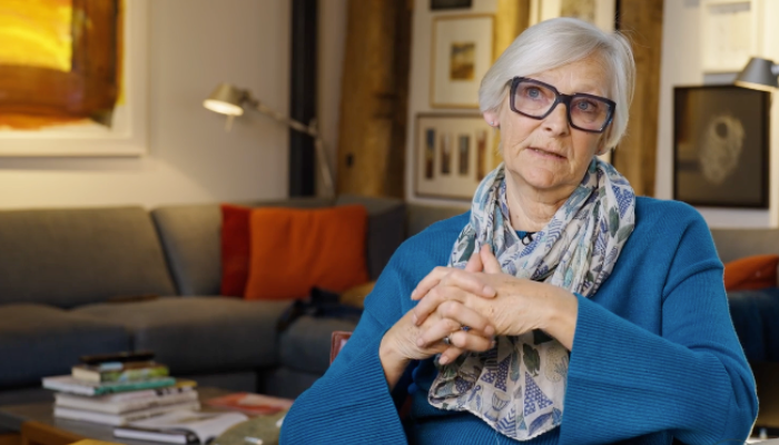 Claire Benn talking to camera during an interview for her course