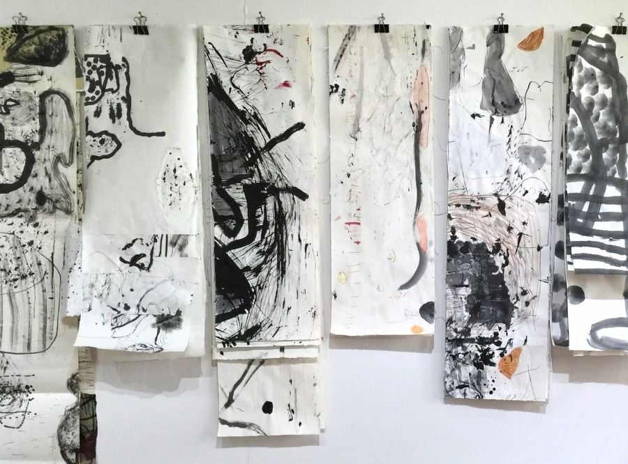 Various pages of mark making on paper