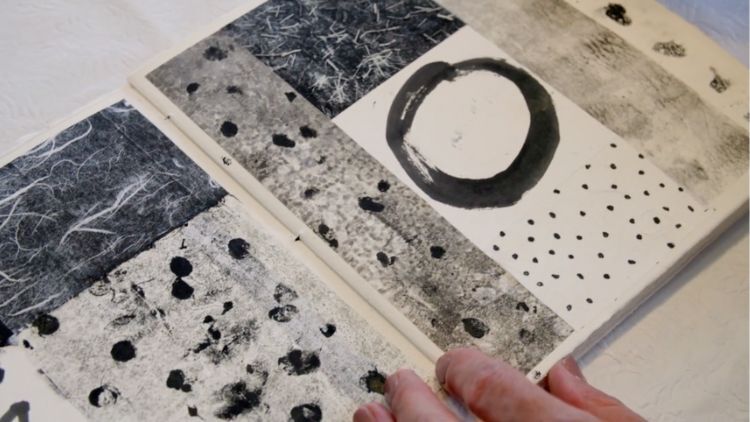 Donna showing some artwork during Essence of Identity