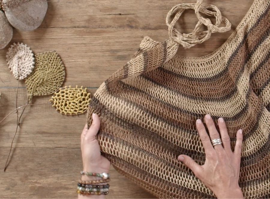 Harriet Goodall's hands showing a weaving technique used during Form to Freedom