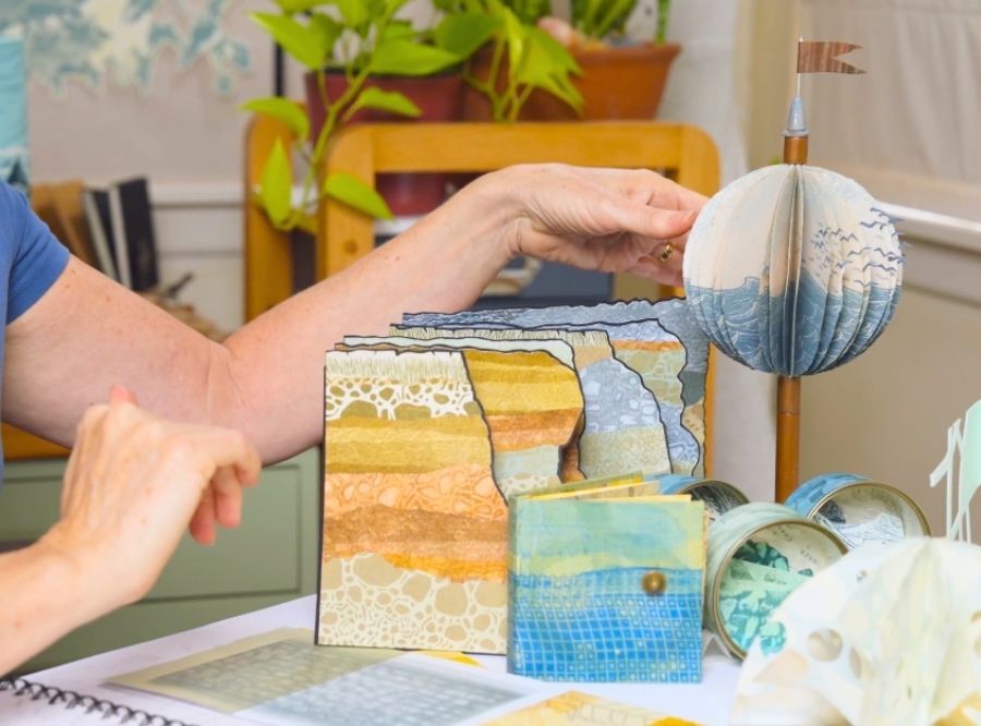 Toni Hartill showing some of her artworks