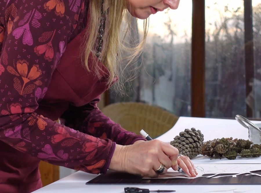 Cordula Kagemann working at her studio table