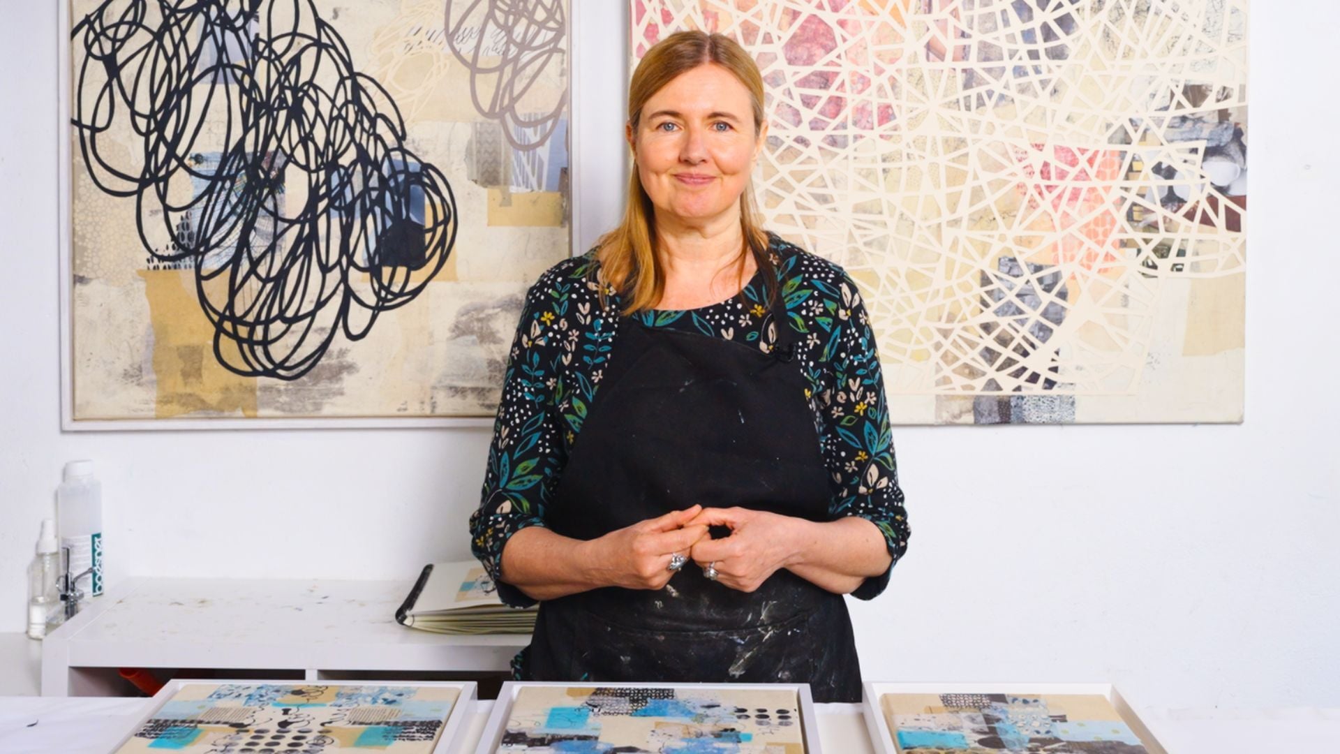 Image of Codula Kagemann smiling at camera in her studio